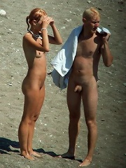 Spy cams film a sunny story of nude fun on a beach